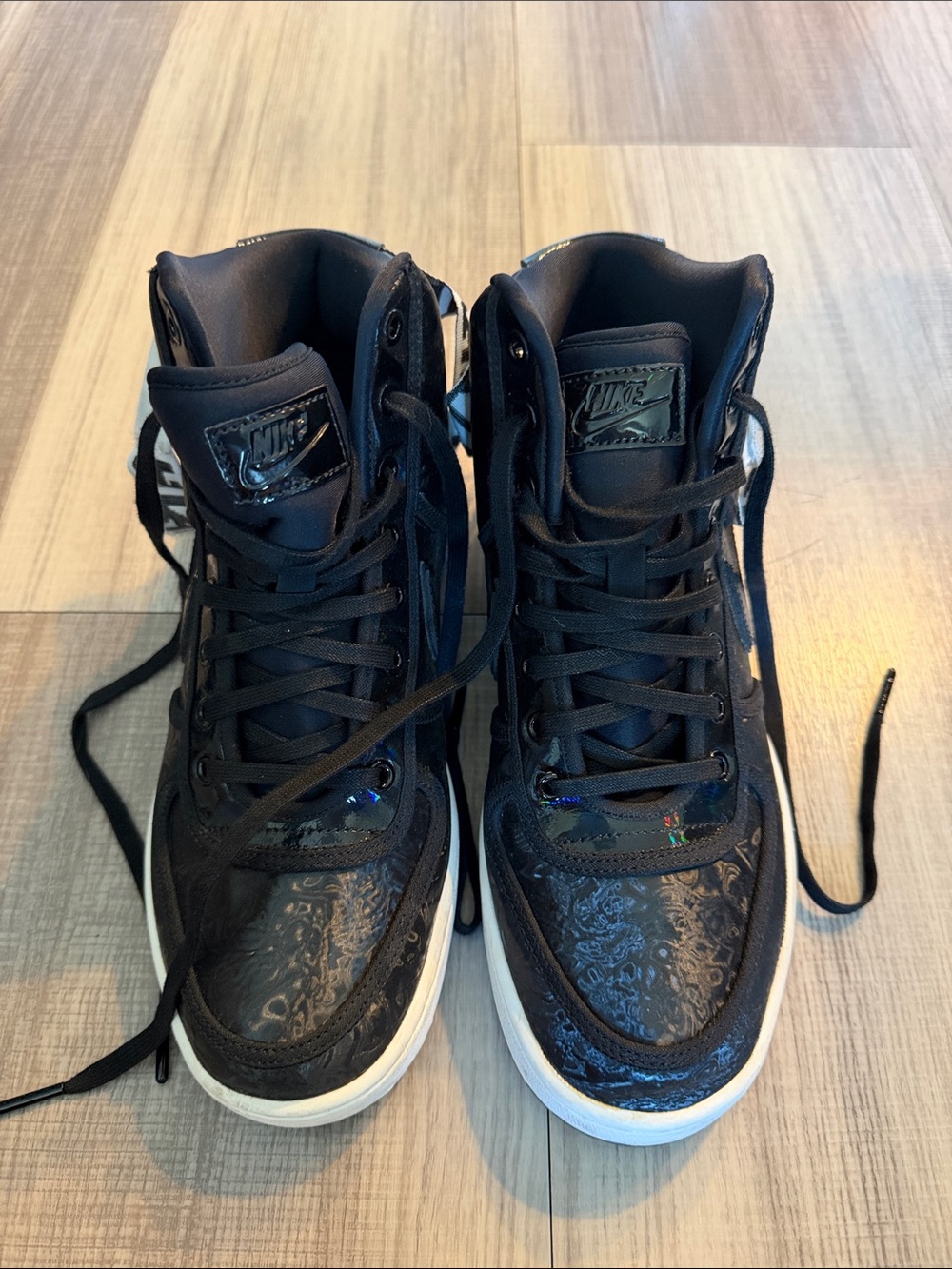 Nike Women's Black High-Top Lace-Up Sneakers with White Sole